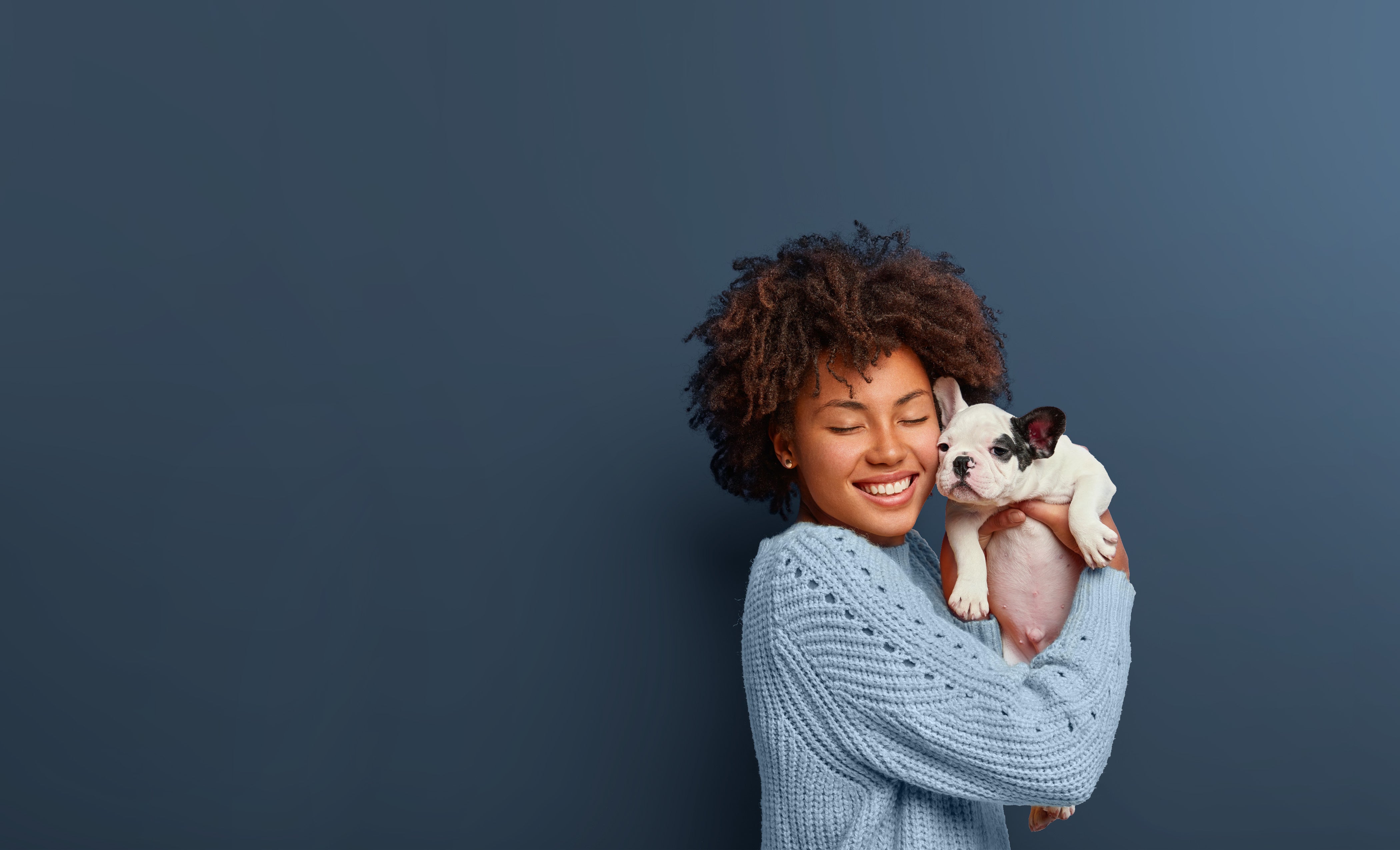 woman holding her dog