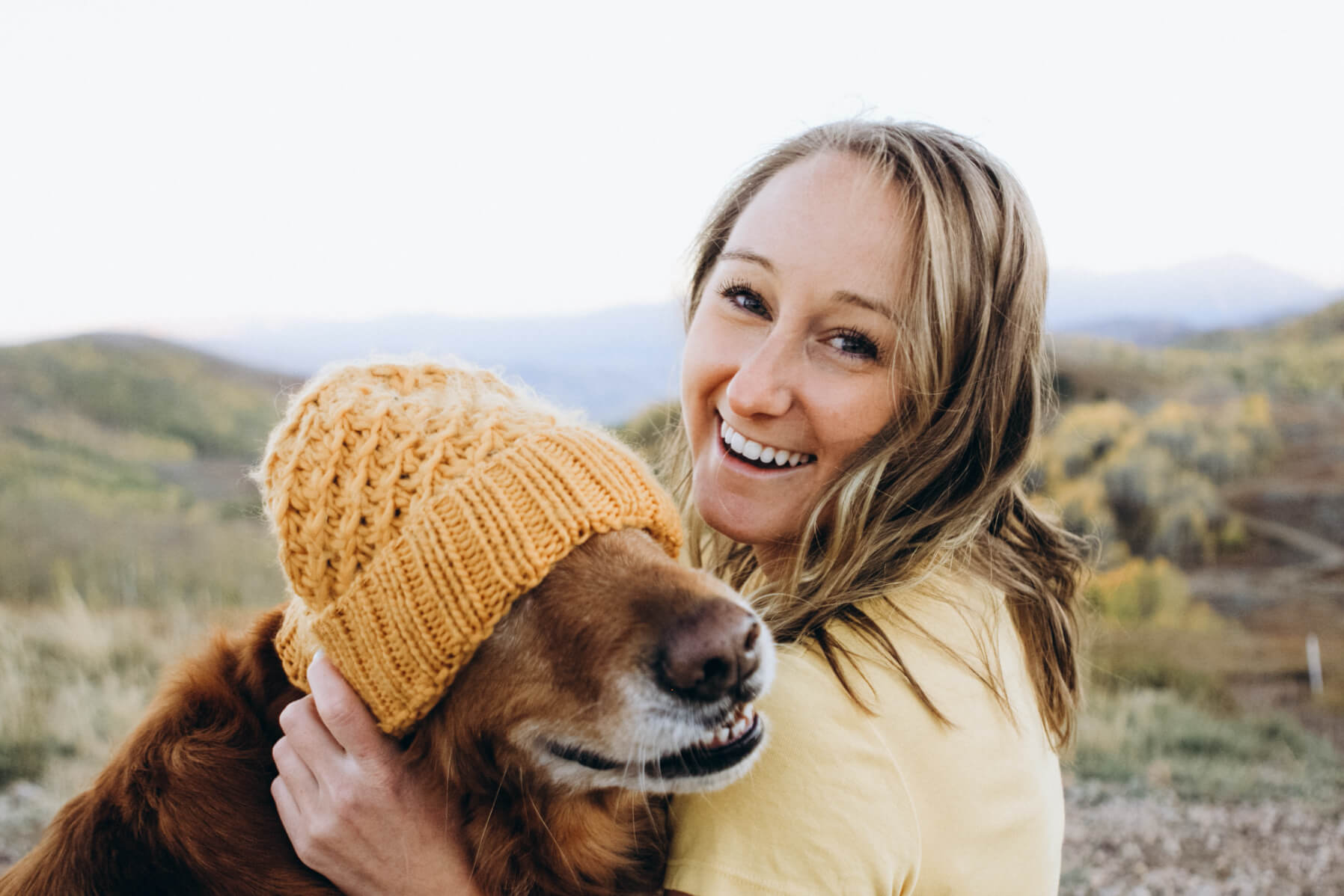 Happy pet owner and dog